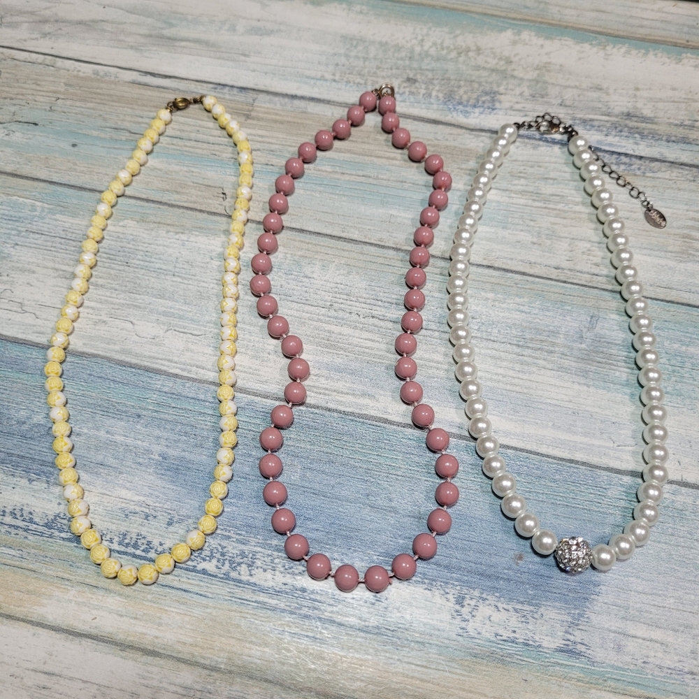 Three Plastic Beaded Necklace.